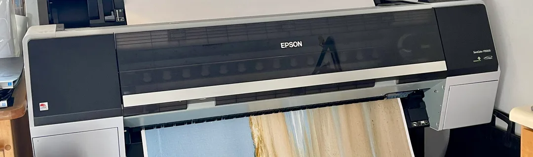 Pro Epson printer printing an archival giclee reproduction on canvas of 