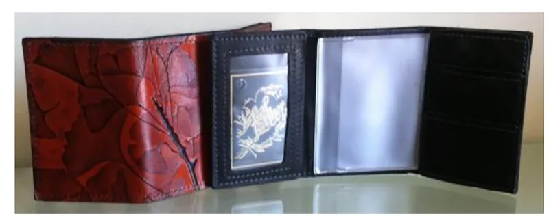 Leaf Leather ID Trifold Men's Wallet with different sections for ID, cards and photos.