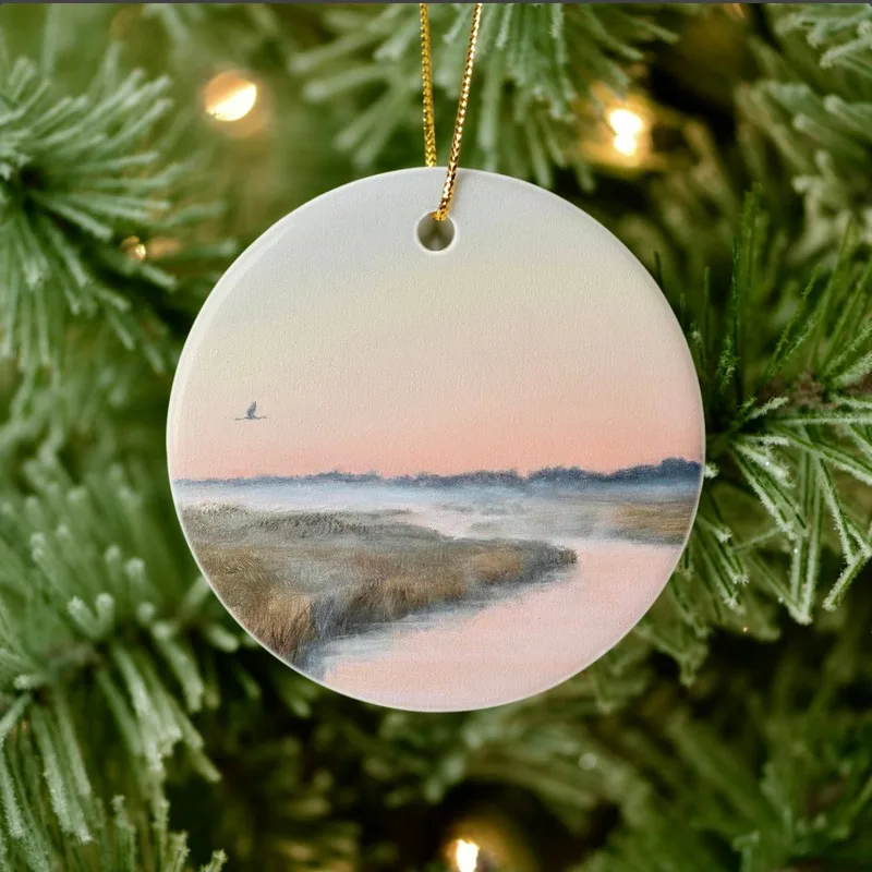 A Great Blue Heron flies "Toward the Dawn" in this porcelain ornament of a misty back bay morning awakening