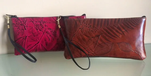 Alex bag shown in red and brown Leaf Leather.