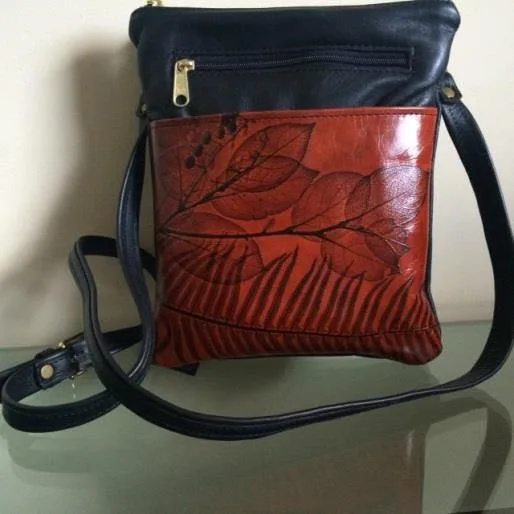 Leaf Leather Savannah Bag with crossbody strap.
